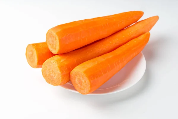 Peeled fresh carrots isolated on white background — Stock Photo, Image