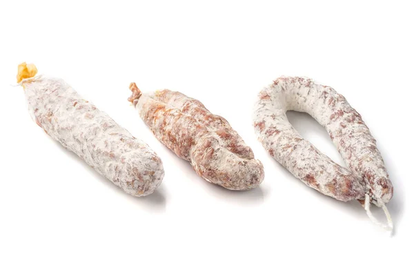 Three kinds  Delicious dry sausage on a white background. — Stock Photo, Image