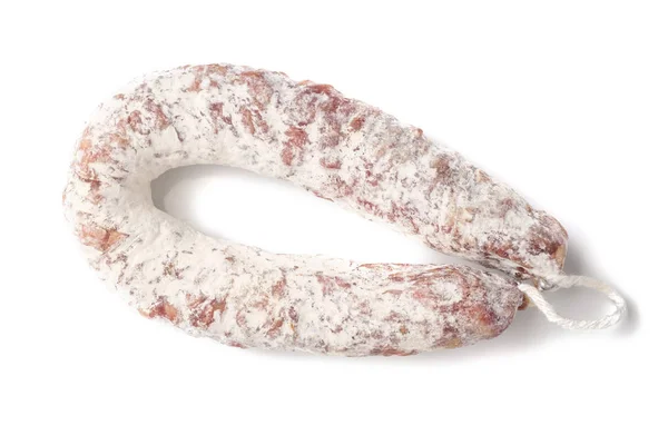 Delicious dry sausage on a white background. Stock Photo