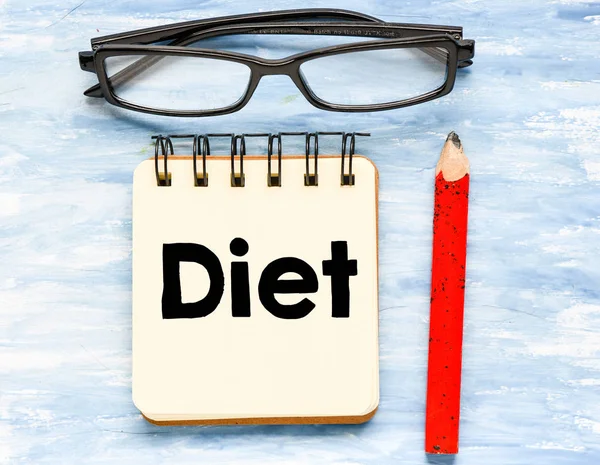 Dieet Word Kladblok Potlood Brillen Blauwe Achtergrond — Stockfoto
