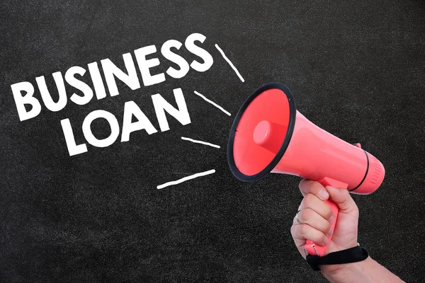 Business loan inscription with loudspeaker in the hand