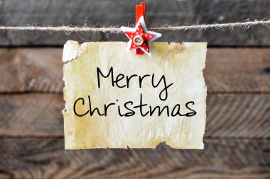 Neşeli Noel yazıt kağıt üzerinde ip eklemek 
