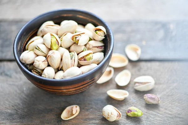 Dark Cup Pistachios Grey Table — Stock Photo, Image