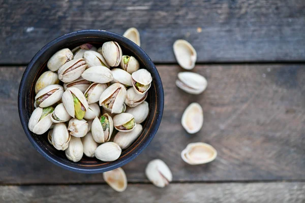 Dark Cup Pistachios Grey Table — Stock Photo, Image