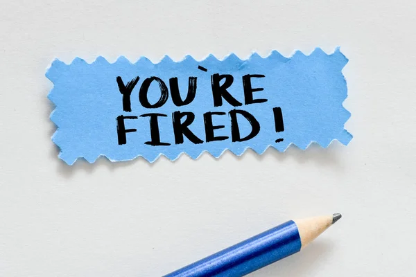 You are fired text with pencil