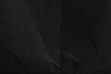 Siyah buruşuk kağıt yüzey, dokulu arka plan.