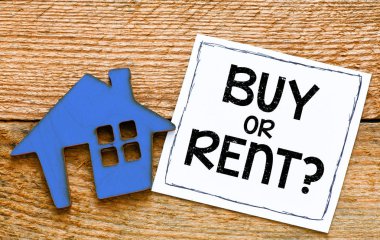 küçük ev figürü ve satın alma veya kira yazısı