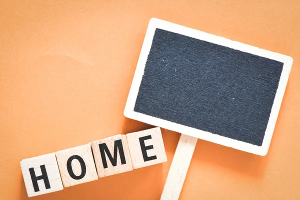 Home Letters Chalkboard Orange Background — Stock Photo, Image