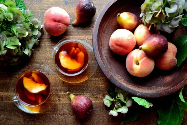 Peach tea,peaches,figs and hydrangeas