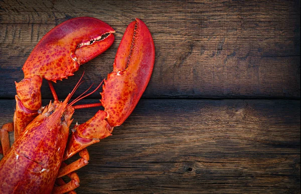 Steamed lobster seafood on wood background — Stock Photo, Image