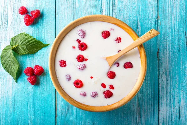 yoghurt raspberry berry fresh sweet berry wooden art background