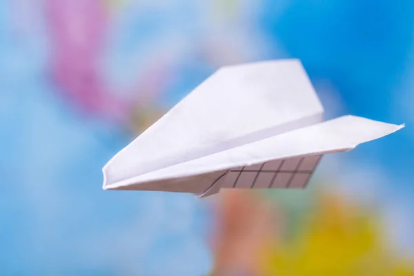 paper plane world map travel