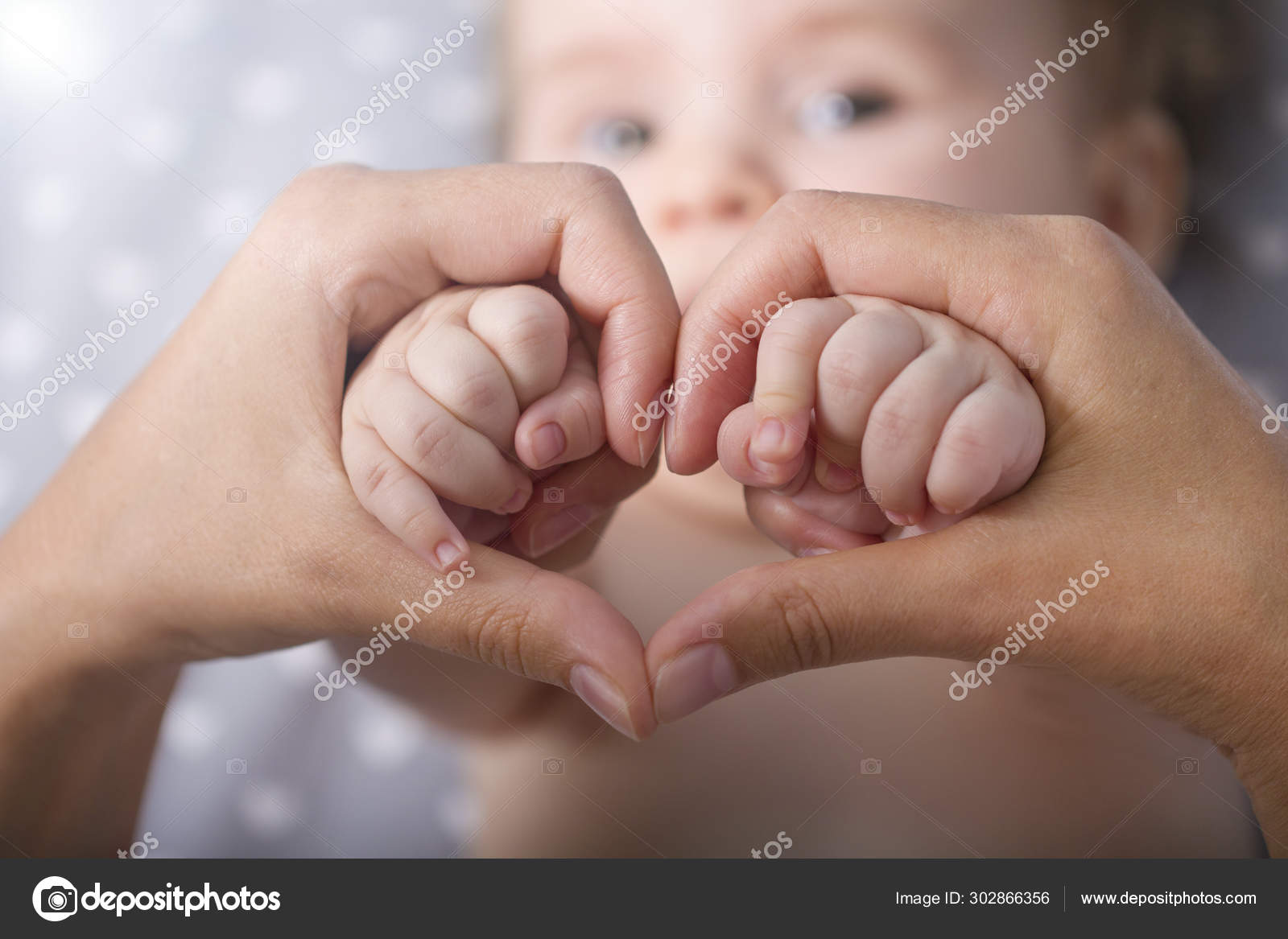 Download Newborn Baby Holding Mother Hands Heart Shape Closeup Baby Hand Stock Photo Image By C Strelov 302866356