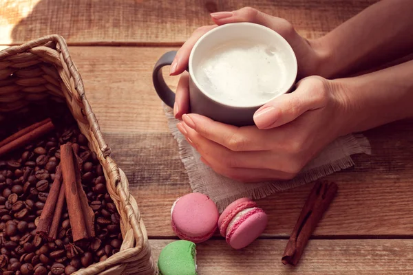 Female Hands Holding Cup Coffee Wooden Background Macaroons — Stock Photo, Image