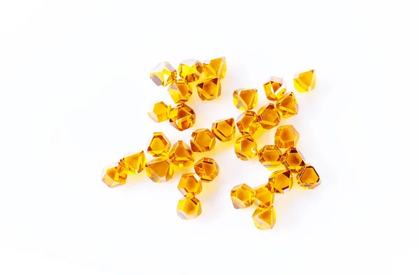 Scattered Yellow Synthetic Diamonds Macro White Background — Stock Photo, Image