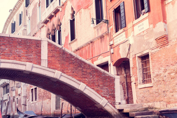 Architecture of the houses with bridge on Ponte Novo street in Venice