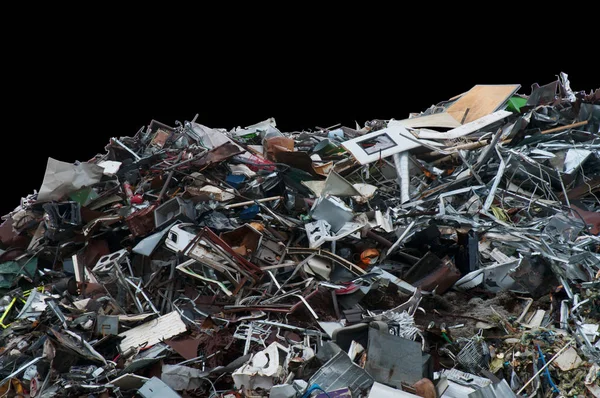 Pile of discarded trash on a black background