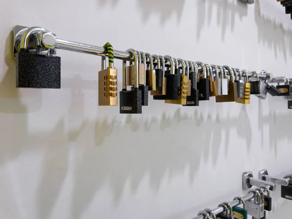 RIGA, LETTONIE - 23 MARS 2019 : Array of pad locks hanging in a gym on the wall — Photo