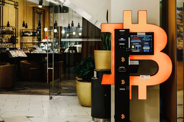 Bitcoin ATM machine in mall for cryptocurrency exchange Stock Picture