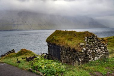 Nordic natural landscape, Mikladalur village, Faroe Islands, Denmark. clipart
