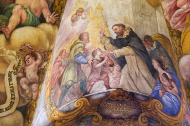 Valencia, Spain - June 15, 2018: Baroque Fresco in Church of Saint Nicholas and Saint Peter Martyr in Valencia, Spain, depicting a scene in the life of St Peter Martyr or Peter of Verona clipart
