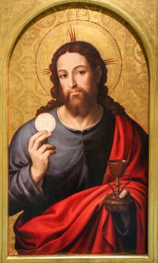Valencia, İspanya - 15 Haziran 2018: Bir kilise İsa Mesih'in Eucharist tutarak tasvir eden Valencia, İspanya, Ortaçağ boyama
