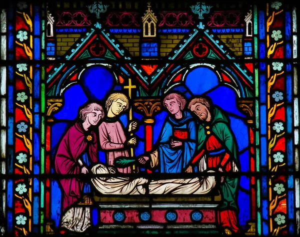 Stained Glass in Notre Dame, Paris - burial rite — Stock Photo, Image