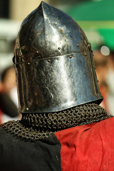 knight\'s helmet with traces of damage