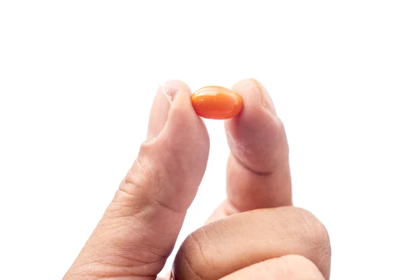 Vitamin Reiskleie Orangefarbene Pillen Zur Hand — Stockfoto