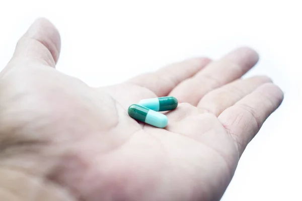 Cápsulas Medicamentos Antibióticos Cápsulas Azules Verdes Mano —  Fotos de Stock