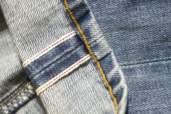 Zbliżenie Denim Jeans Czerwone Krajki Czerwony Obręczy — Zdjęcie stockowe