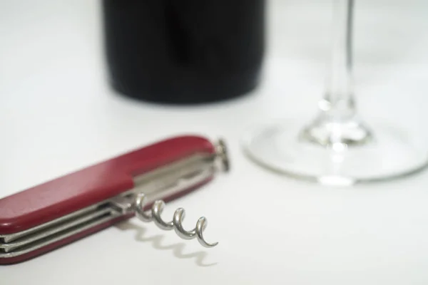 Folding Knife Wine Opener Glass Wine Bottle White Background — Stock Photo, Image