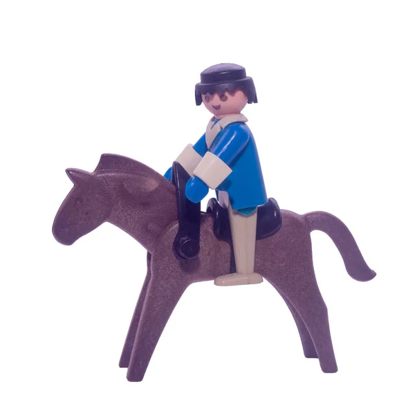 Boneca Plástico Homem Montando Cavalo Fundo Branco — Fotografia de Stock