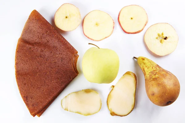 Ingredients for fruit pastille made of pears and apples on white background