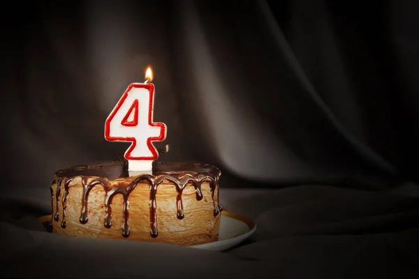 Quatre Ans Gateau Au Chocolat D Anniversaire Avec Bougie Blanche Brulante Sous La Forme Du Numero Quatre Fond Sombre Avec Tissu Noir Doux Evenement Stock Photo Quatre Ans Gateau Au Chocolat D Anniversaire Avec Bougie Blanche Brulante Sous La Forme Du Numero Quatre Fond Sombre Avec Tissu Noir Doux Evenement Stock Photo