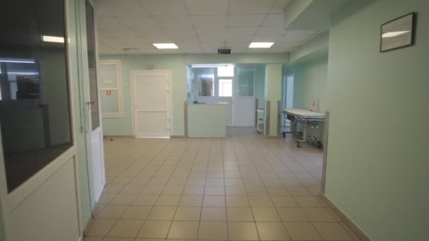 Empty hall Hospital, with cabinets clinic, of a large building. Quarantine. Hospital in-patient unit, operating. — Stock Video