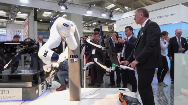 IBG presenting robot and human collaboration on Messe fair in Hannover, Germany — Stock Video