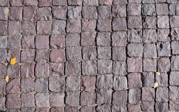 Paving stones on the bridge leading to the Trinity Church. Russia, Moscow, September 2018