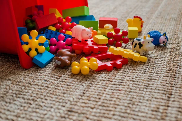 Childrens playroom with plastic colorful educational blocks toys. — Stock Photo, Image