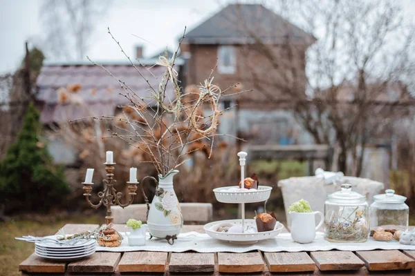 Decorative Easter eggs served festive table. Farm. Rustic style. — Stock Photo, Image