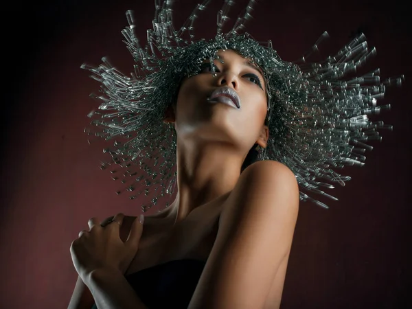 motion shot of model with pin wig and silver lips