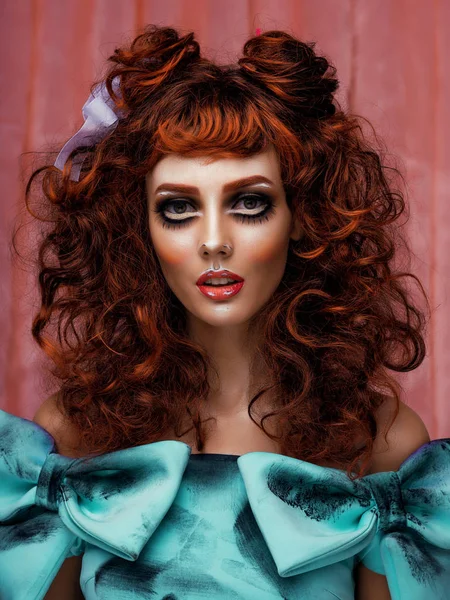 portrait of model with hairstyle and art makeup