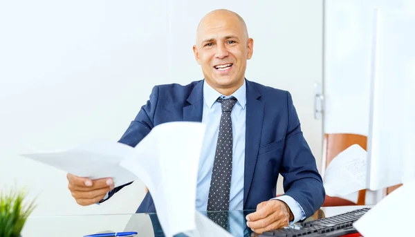 Frustrated business man working at office interior — Stock Photo, Image