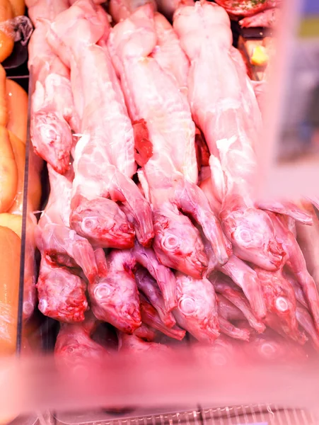 Showcase meat raw products in a supermarket — Stock Photo, Image