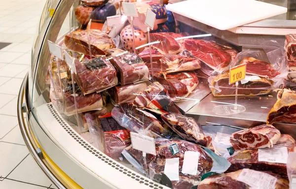 pork ham, jamon on the shop window at supermarket