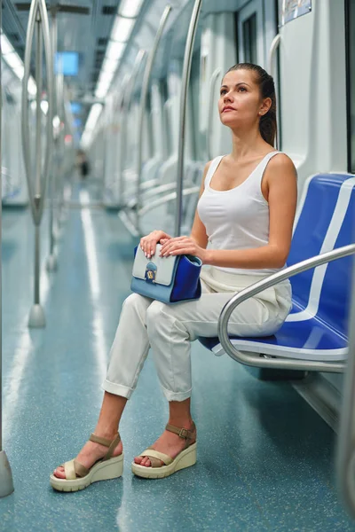 Young woman portrait inside metro subway — Stock Photo, Image