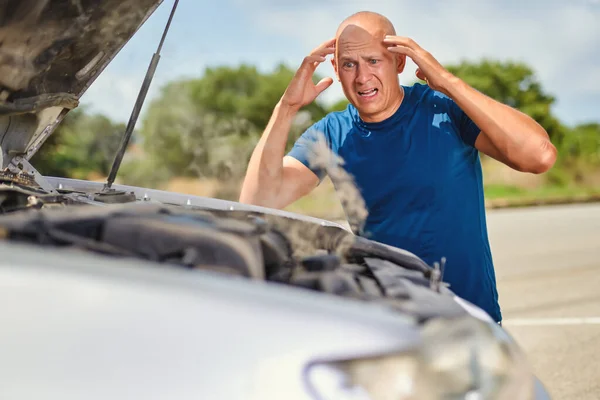 Driver man in front of automobile car accident in road. — Stock Photo, Image