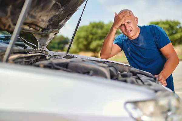 Driver man in front of automobile car accident in road. — Stock Photo, Image