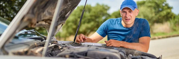 Driver man in front of automobile car accident in road. — Stock Photo, Image