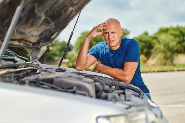 Upset driver man in front car collision accident in road — Stock Photo, Image